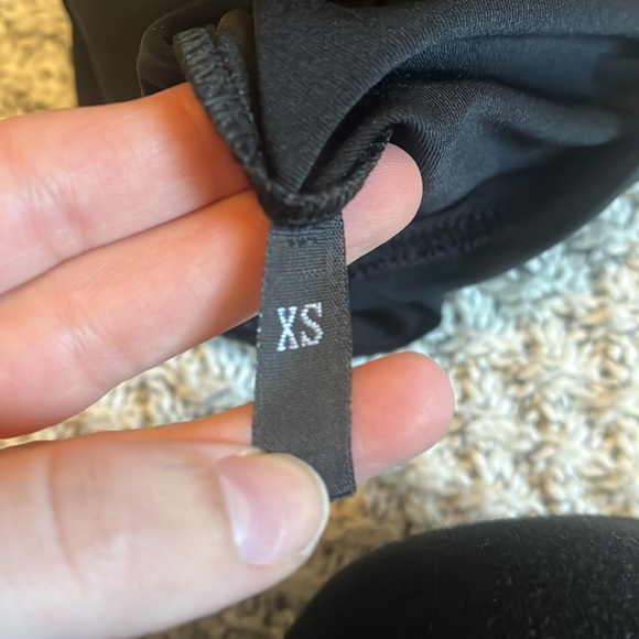 Black dress with asymmetrical length in size extra small - Picture 3 of 3